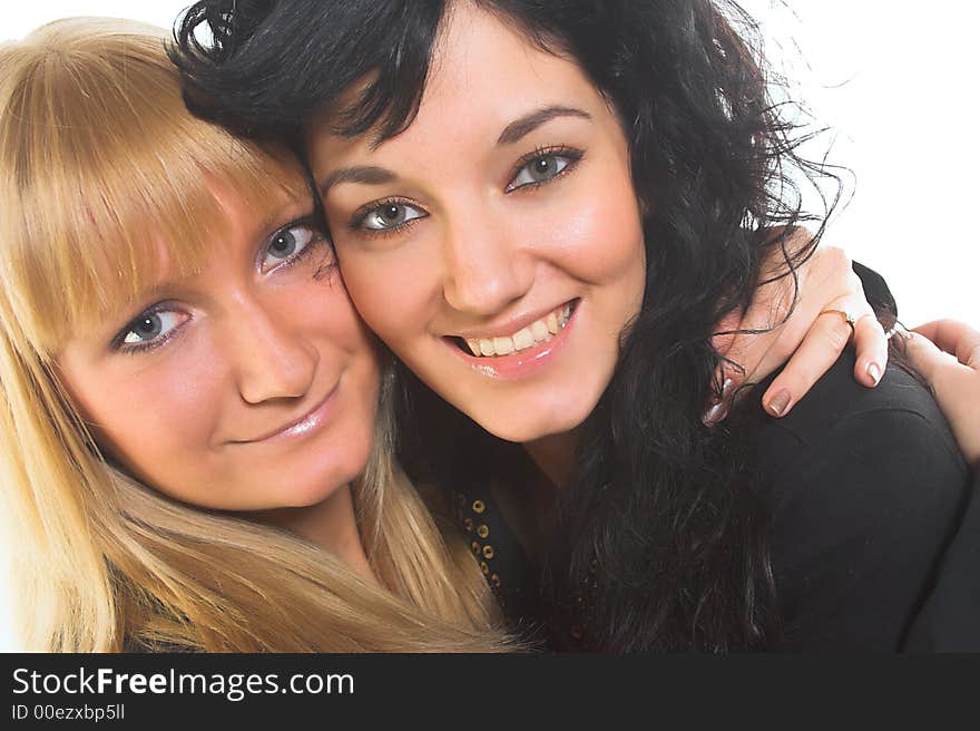 Close-uo portrait of happy young women friends talking and laughing. Close-uo portrait of happy young women friends talking and laughing.