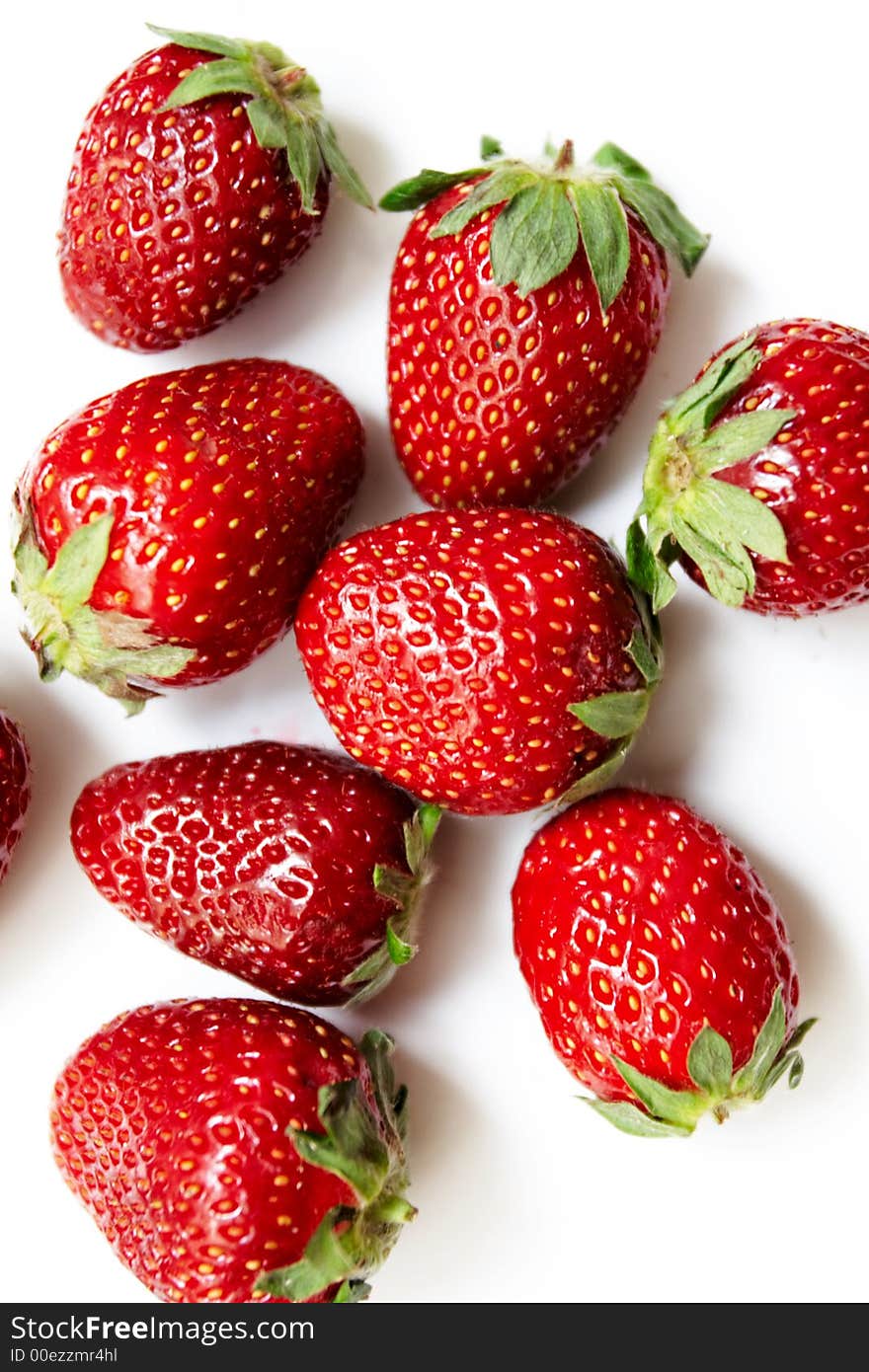 Eight ripe strawberries on a white background. Eight ripe strawberries on a white background