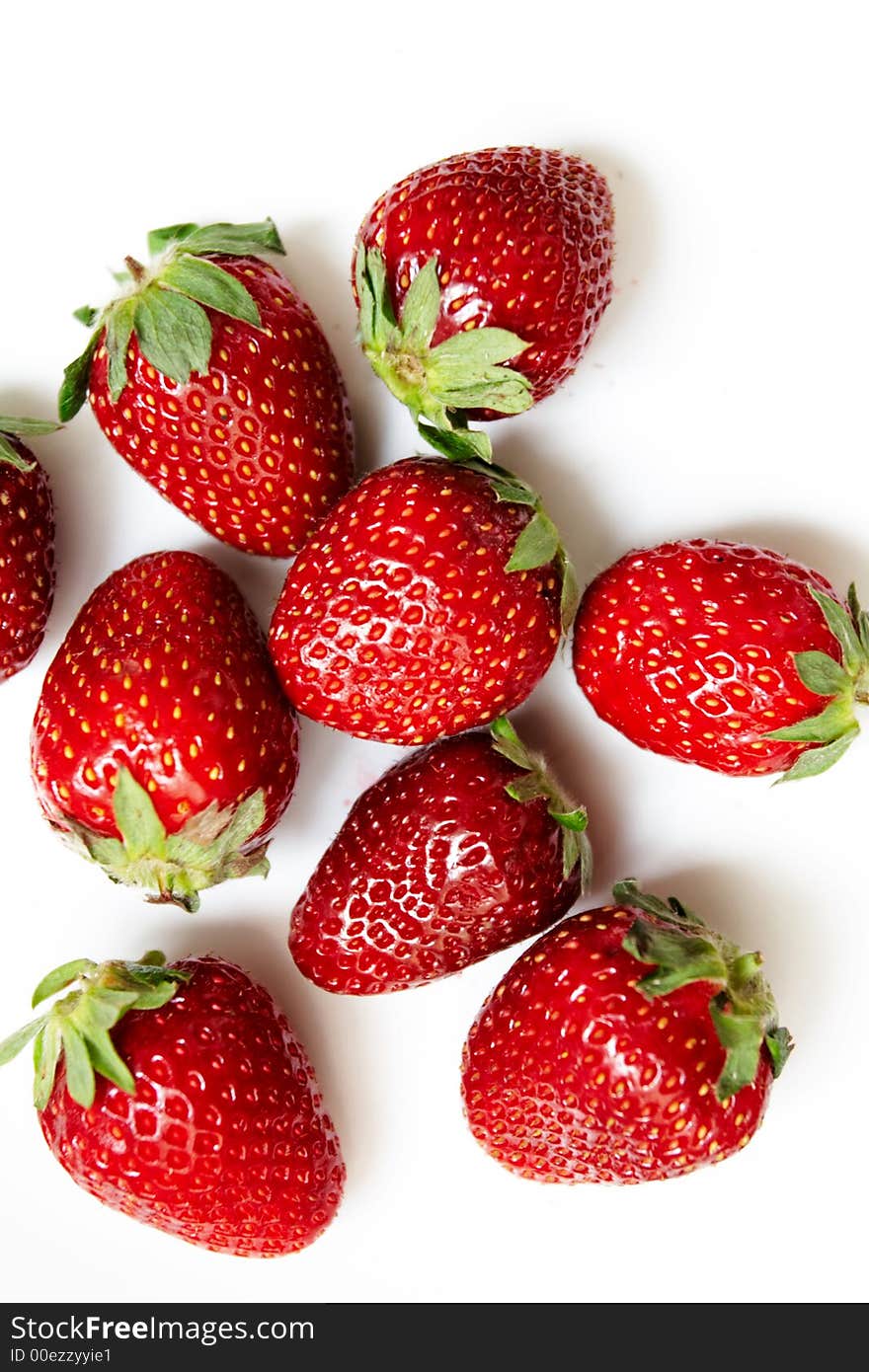 Red ripe strawberries on a white background