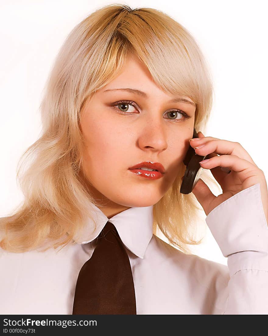 Attractive young woman calling by mobile phone. Isolated over white. Attractive young woman calling by mobile phone. Isolated over white