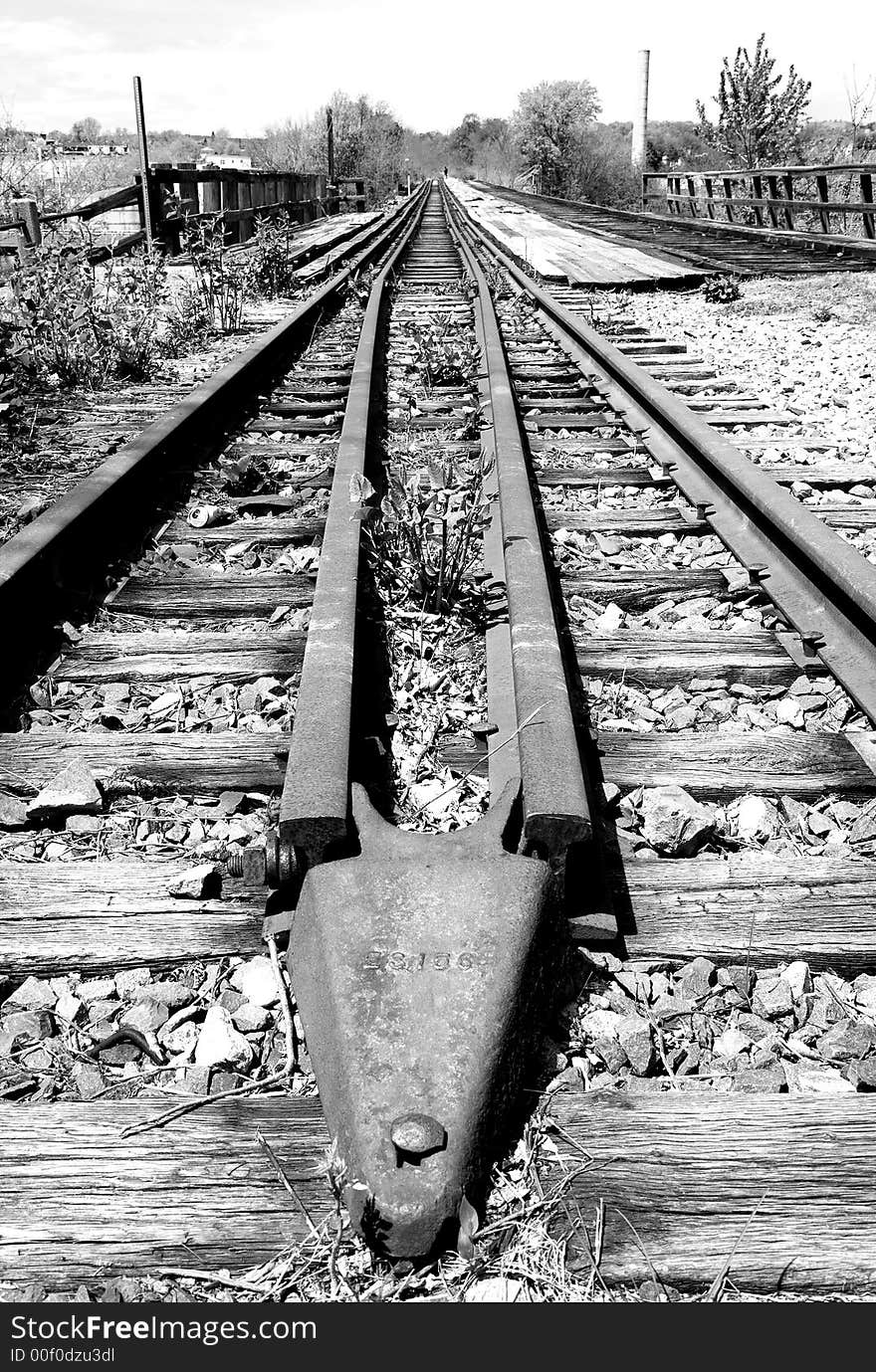 Old railroad no longer in use going off into the distance. Old railroad no longer in use going off into the distance