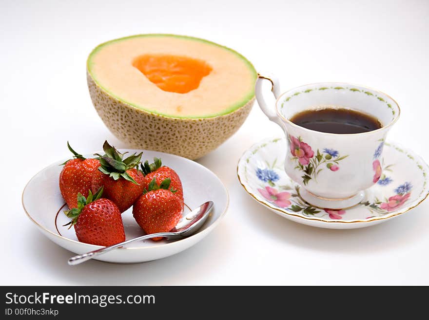 Colorful display of fruit and tea or coffee. Colorful display of fruit and tea or coffee.