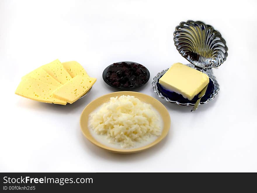 Some beautiful plates with meal on a white background