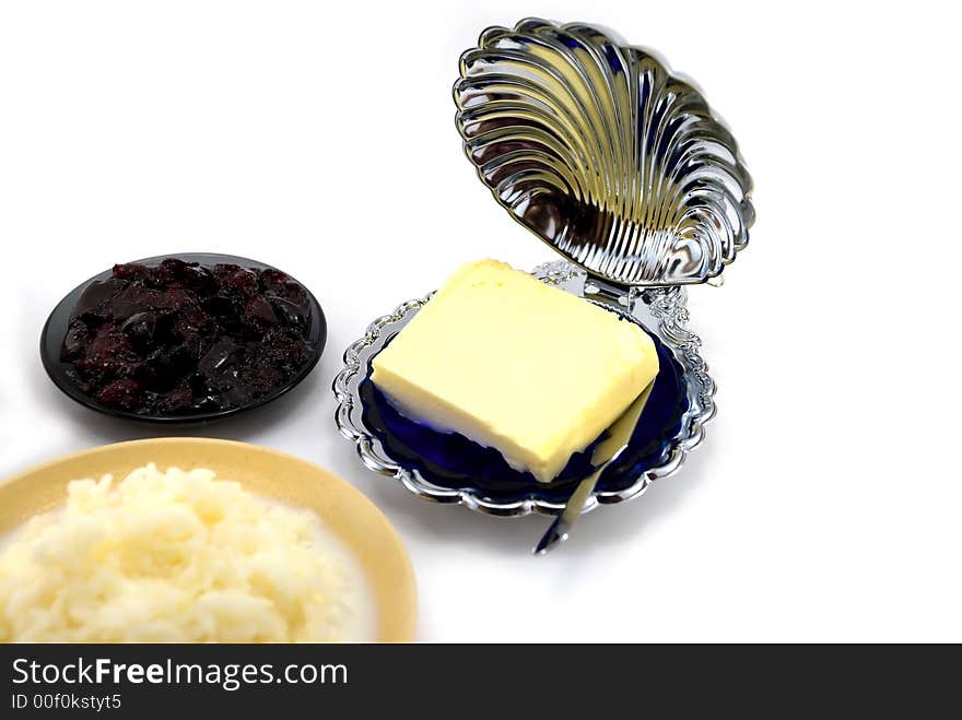 Some beautiful plates with meal on a white background