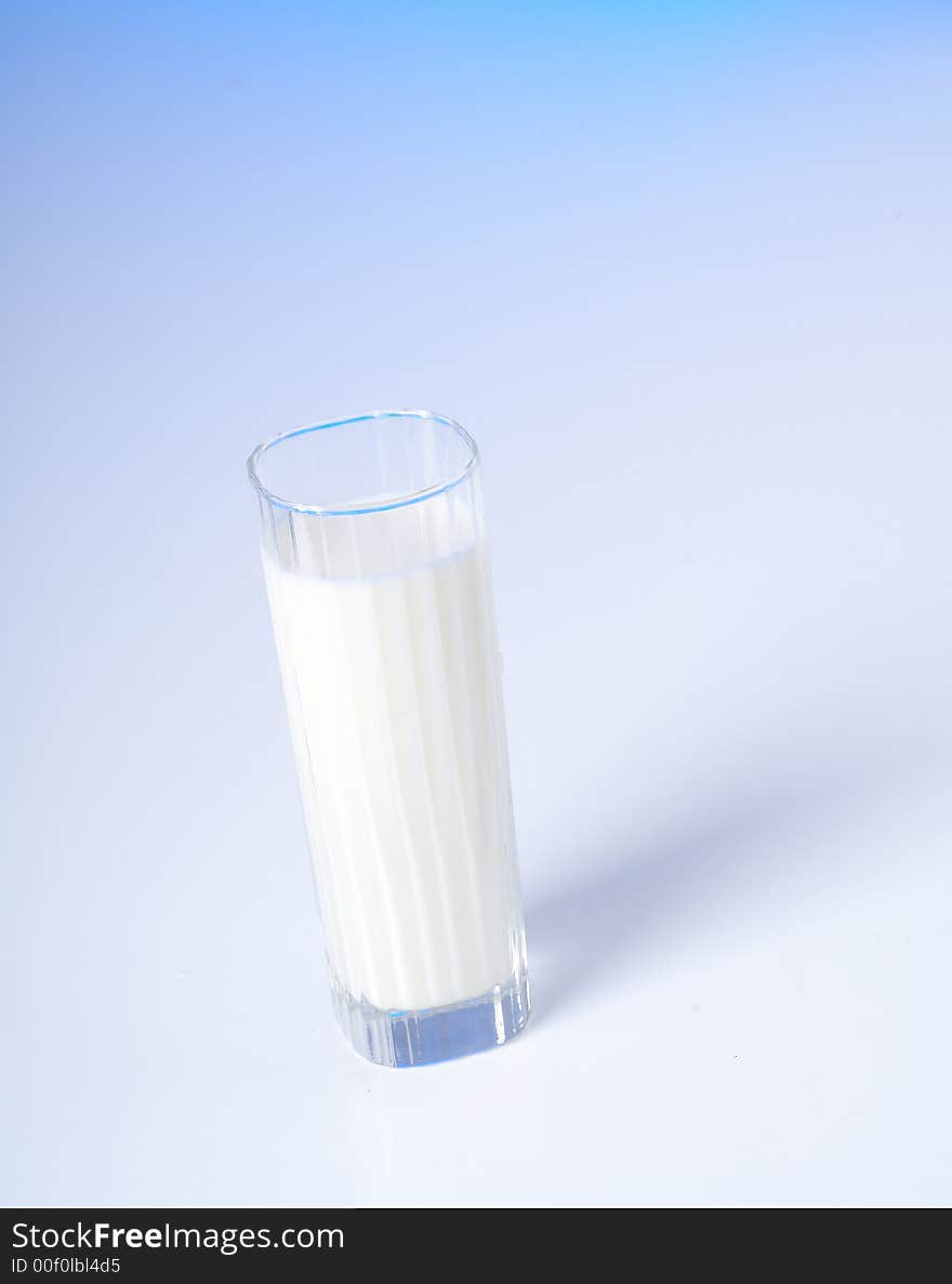 Small glass of fresh milk