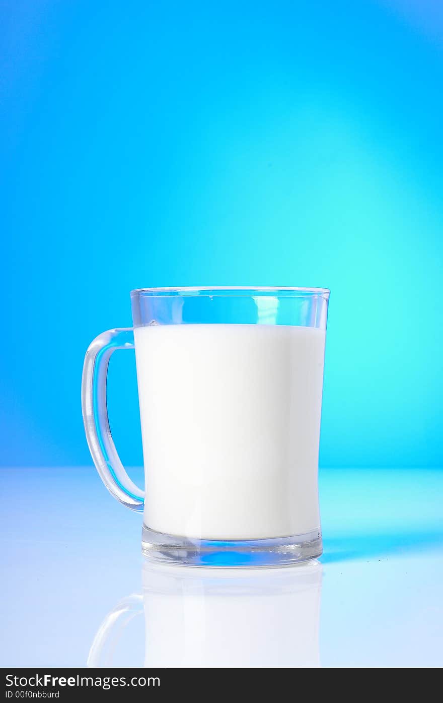 Small glass of fresh milk