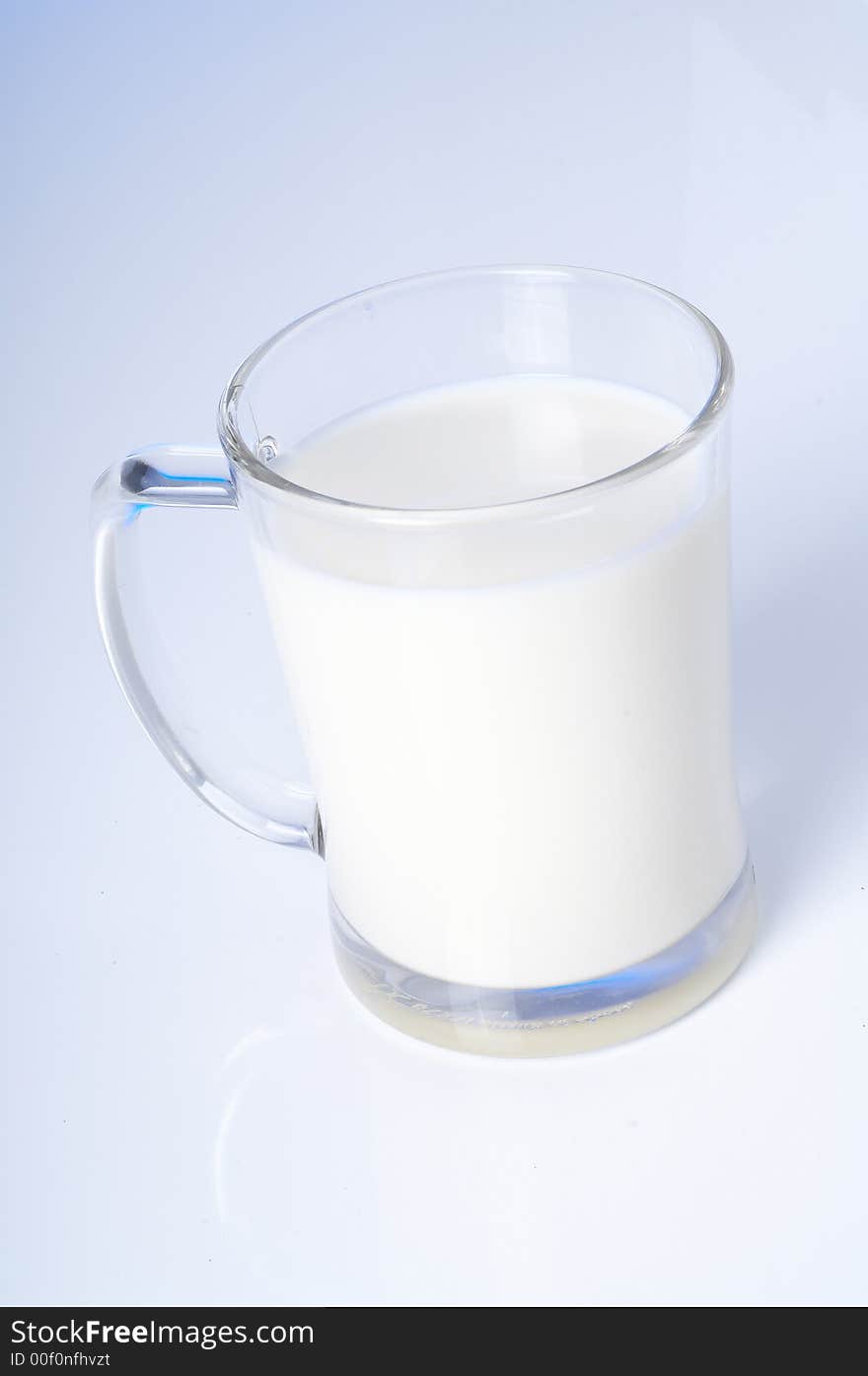 Small glass of fresh milk