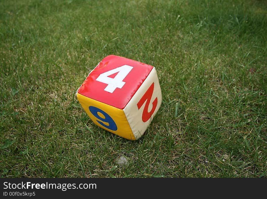 A childern toy in backyard. Left after play. A childern toy in backyard. Left after play.