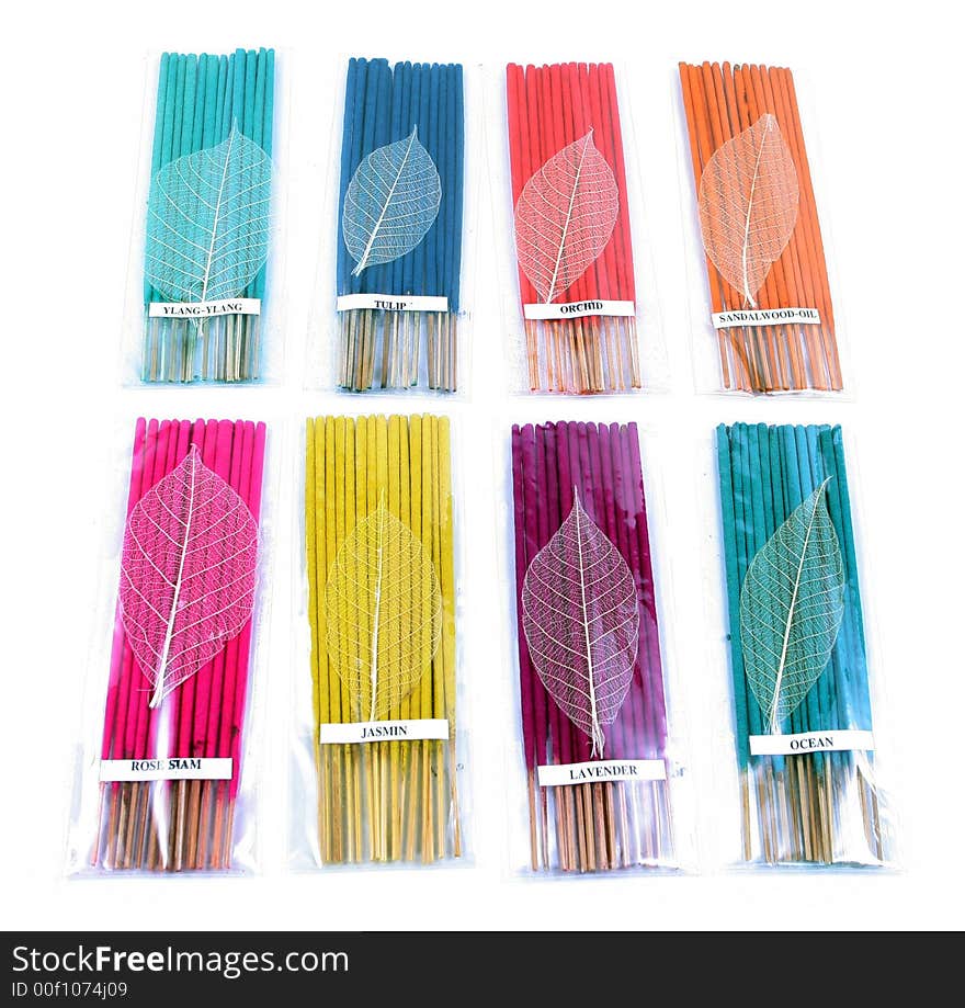 Colorful incense sticks isolated on white