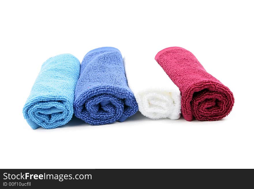 Colorful towels isolated on a white background