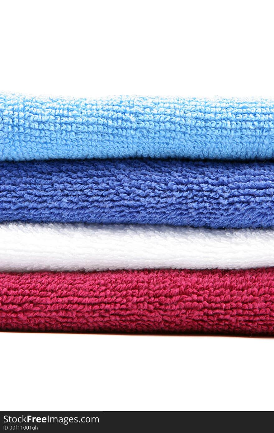 Colorful towels isolated on a white background