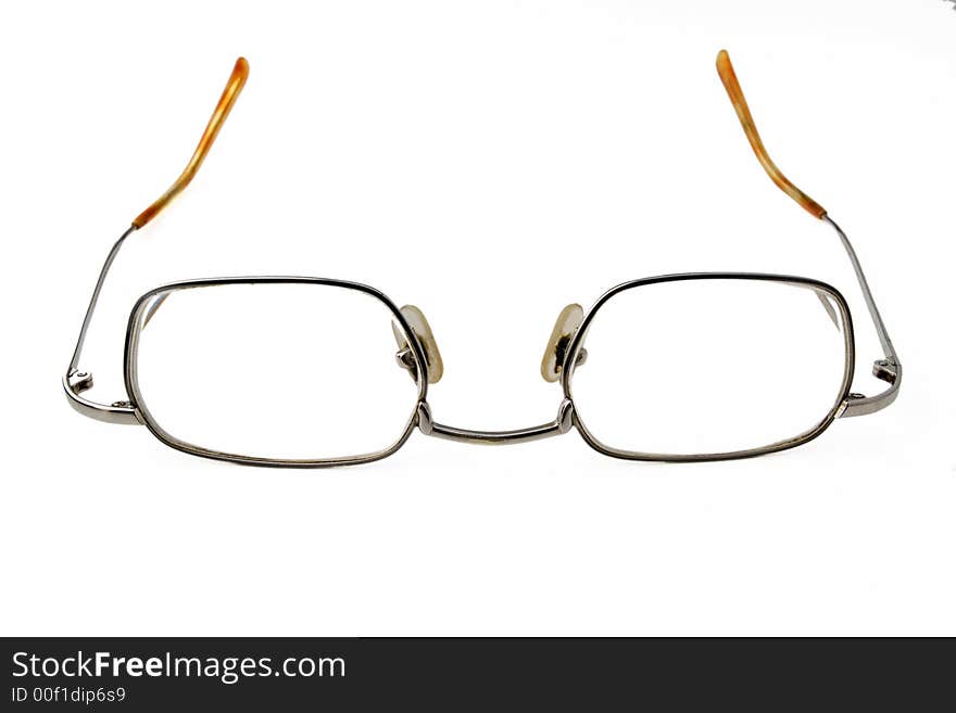 Pair of spectacles on white background