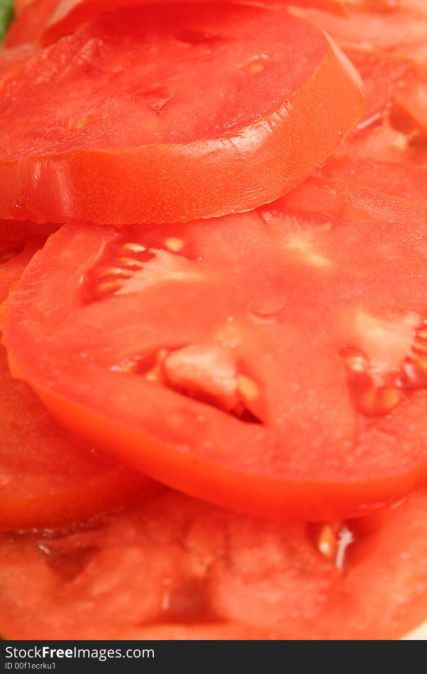 Sliced tomatos vertical