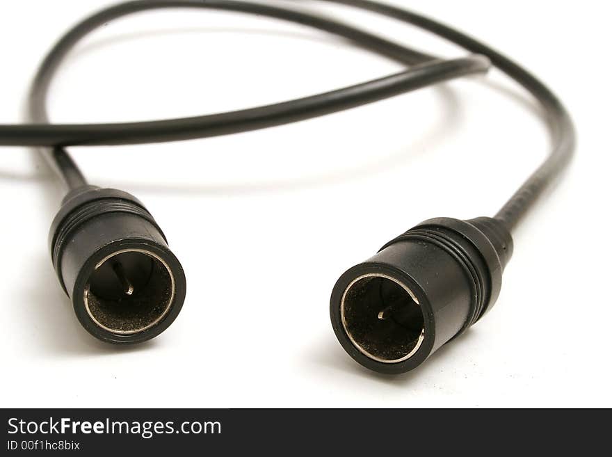 Isolated photo of a black av cord on white