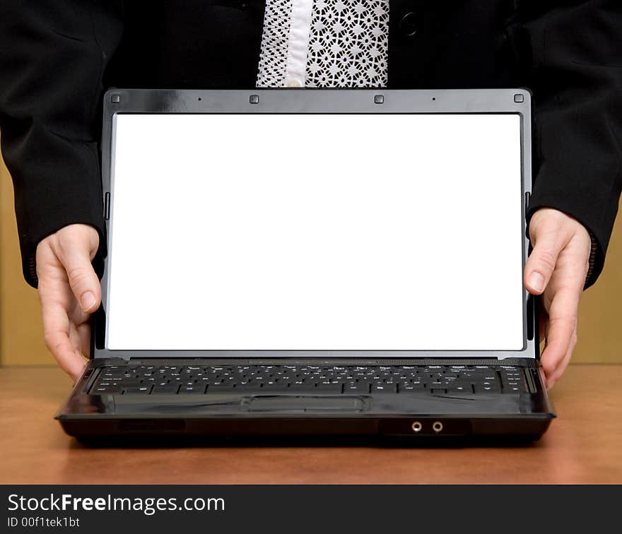 Business person's hands holding a laptop white. Business person's hands holding a laptop white