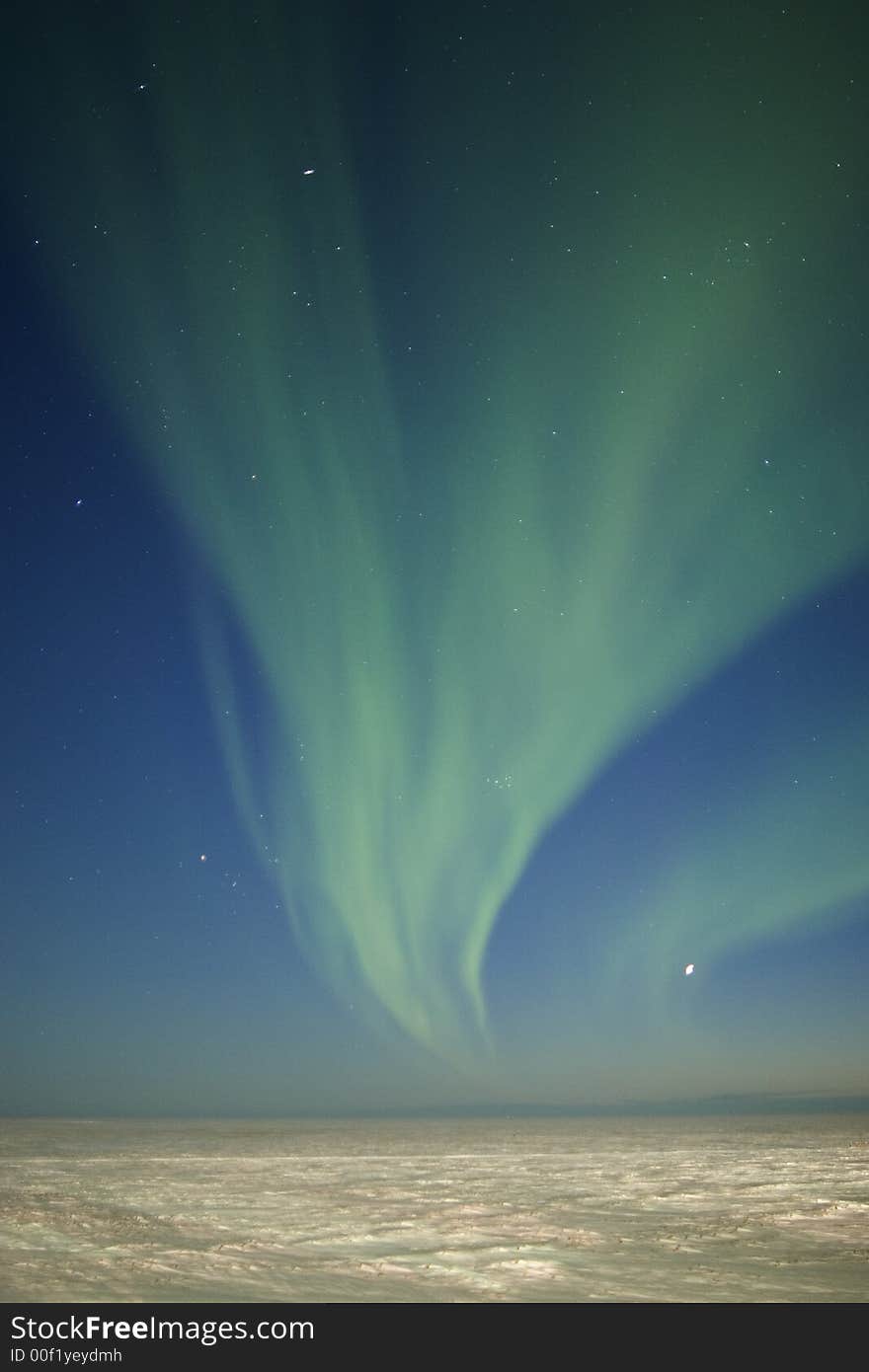 Aurora Borealis display in the sky over arctic tundra. Twilight time. Aurora Borealis display in the sky over arctic tundra. Twilight time