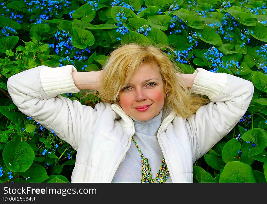 Girl laying on the flowers