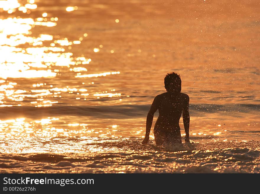 Boy in the at sunset. Boy in the at sunset