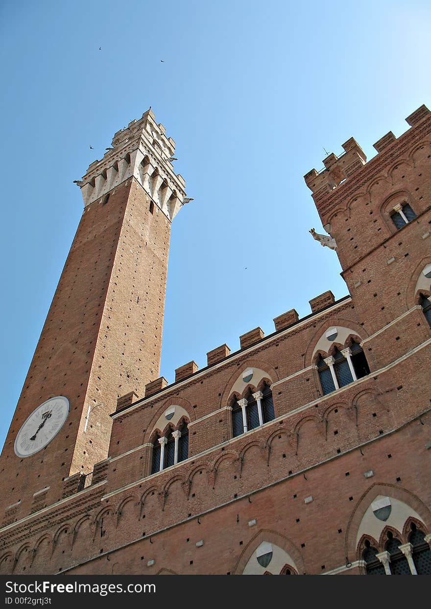 A view from  Piazza del Campo of the Palazzo Comunale and Torre del Mangia, Siena, Tuscany, Italy. A view from  Piazza del Campo of the Palazzo Comunale and Torre del Mangia, Siena, Tuscany, Italy