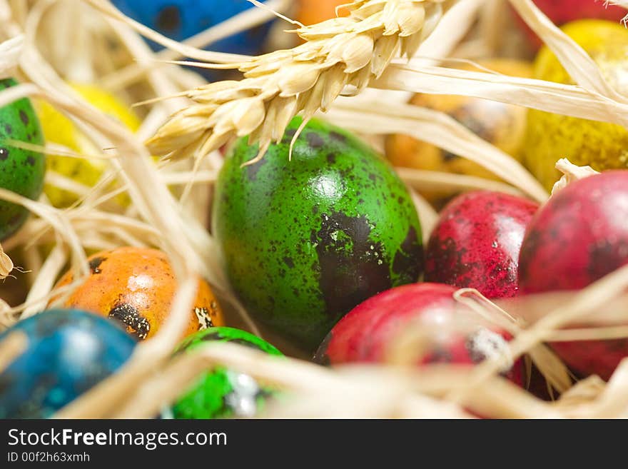 Easter eggs in straw nest. Easter eggs in straw nest