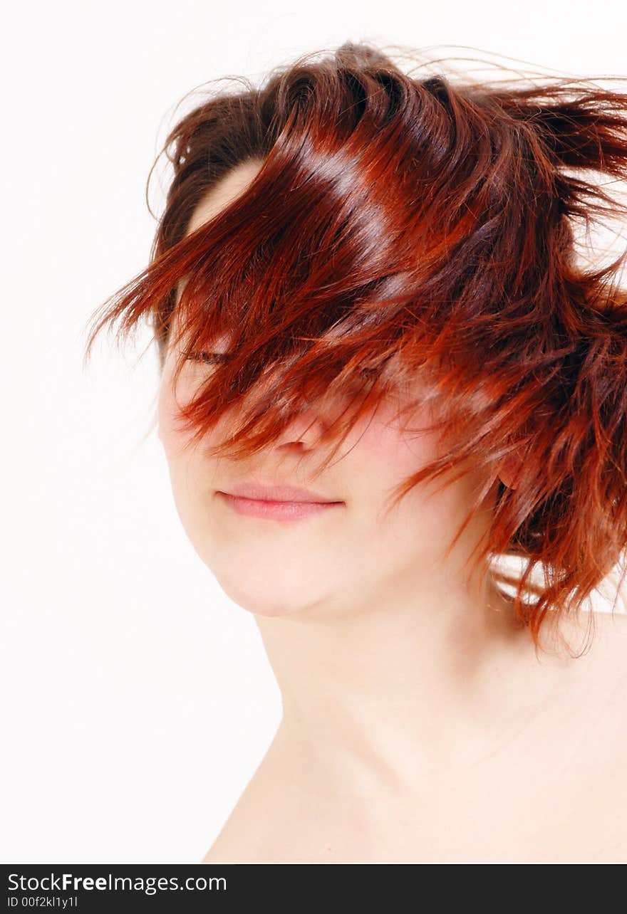 Tossing Red hair in a studio cute woman. Tossing Red hair in a studio cute woman