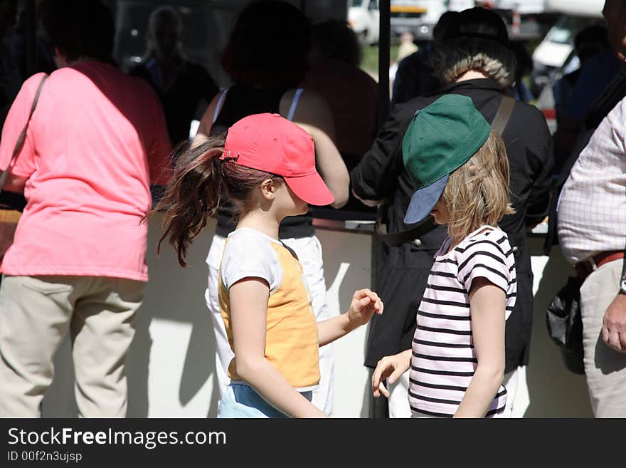 Two girls with the caps