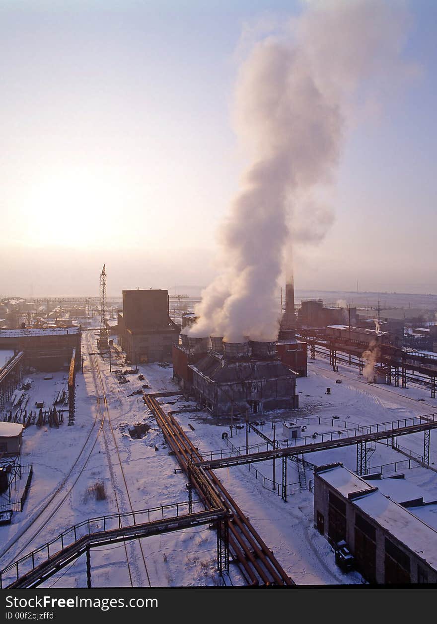 Early morning on metallurgical plant. Blast furnace at sunrise. Early morning on metallurgical plant. Blast furnace at sunrise