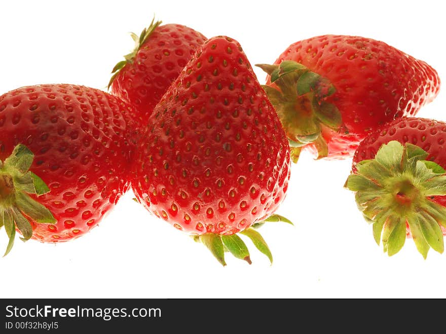 Red strawberries on white bakcground. Red strawberries on white bakcground