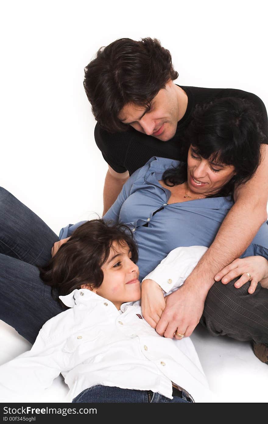 Happy family spending time together over white background. Happy family spending time together over white background