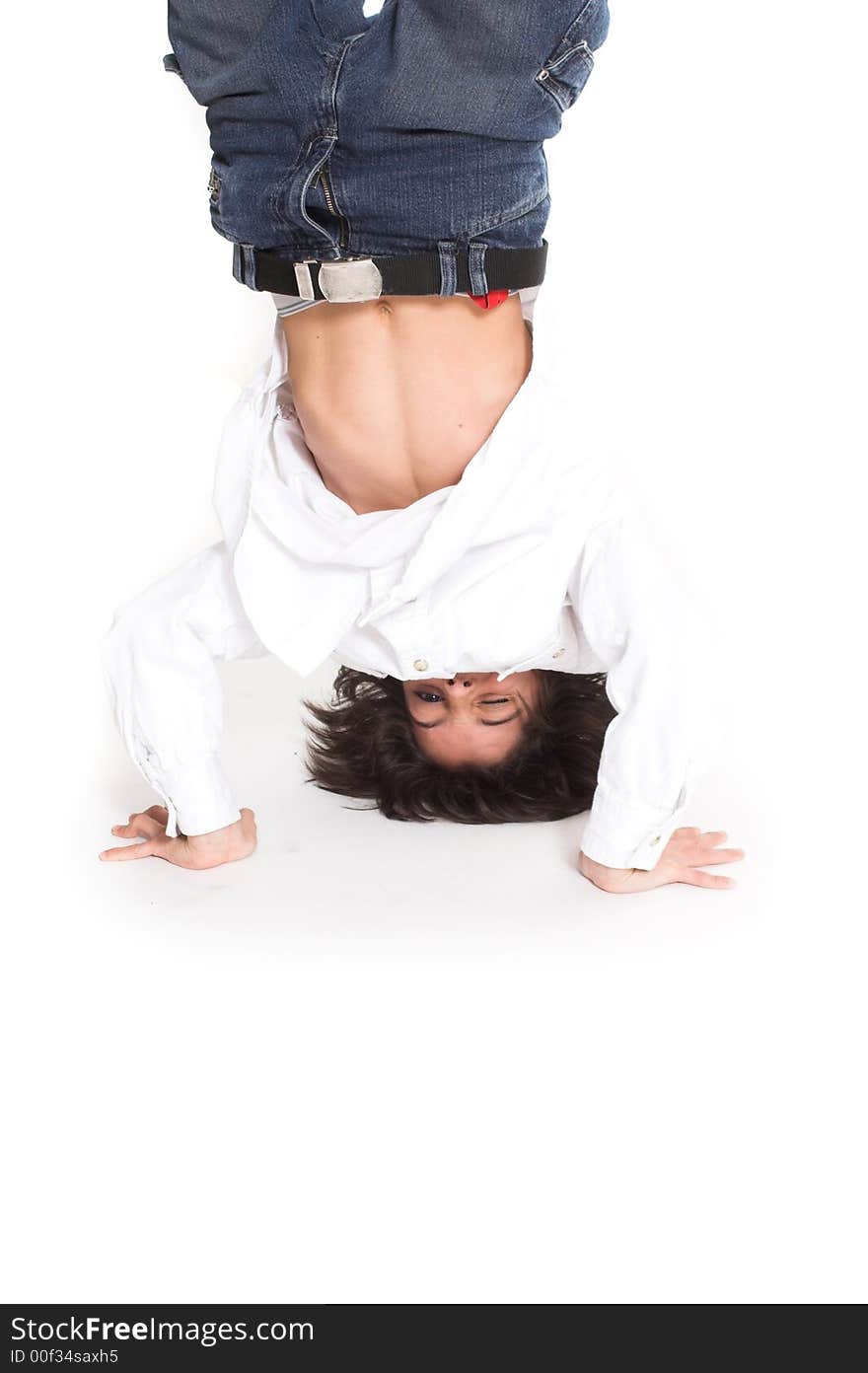 Teen up side down over white background. Teen up side down over white background