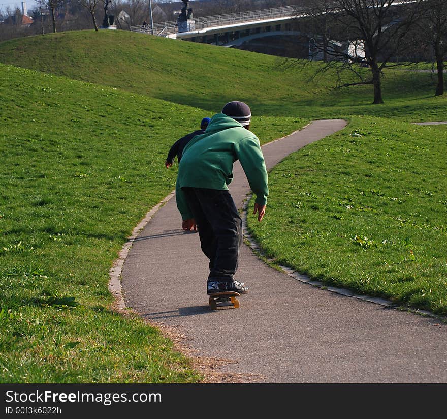 Skating down the hill with speed. Skating down the hill with speed