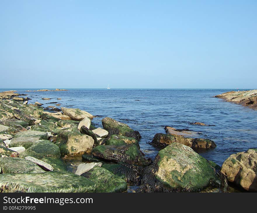 Early morning rocky beach scene. Early morning rocky beach scene