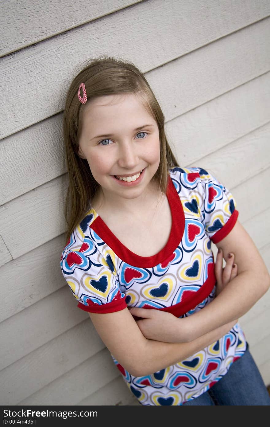 Darling and fashionable preteen girl smiling. Darling and fashionable preteen girl smiling