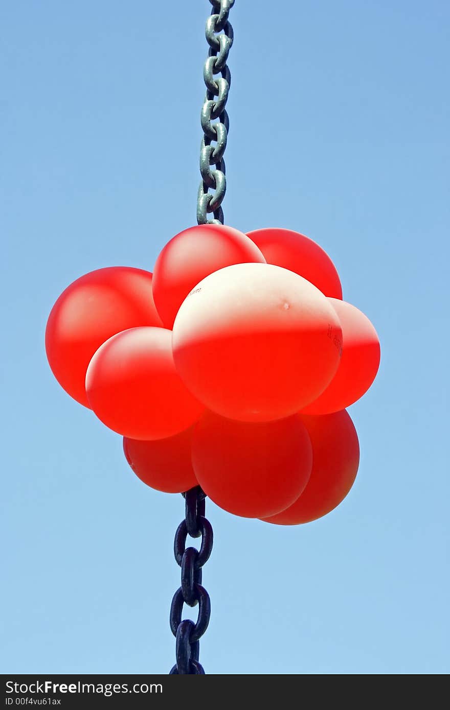 Red balloons on a chain