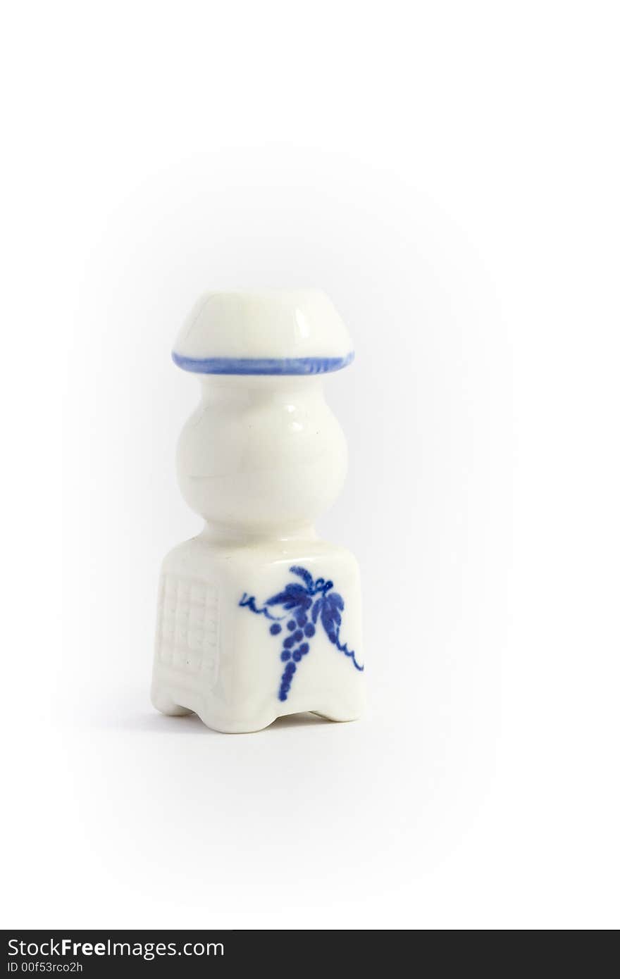 An white china vase is a home object