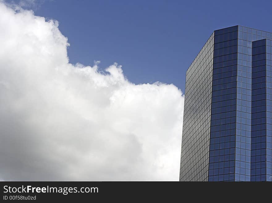 Modern office buildings in an urban settings reaches the clouds. Modern office buildings in an urban settings reaches the clouds