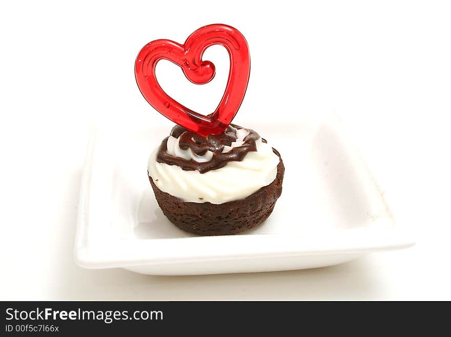 Isolated photo of a heart brownie on white