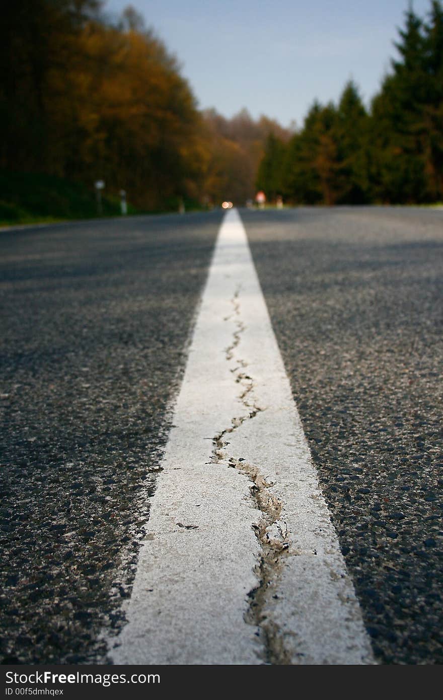 Empty road and a crack. Empty road and a crack