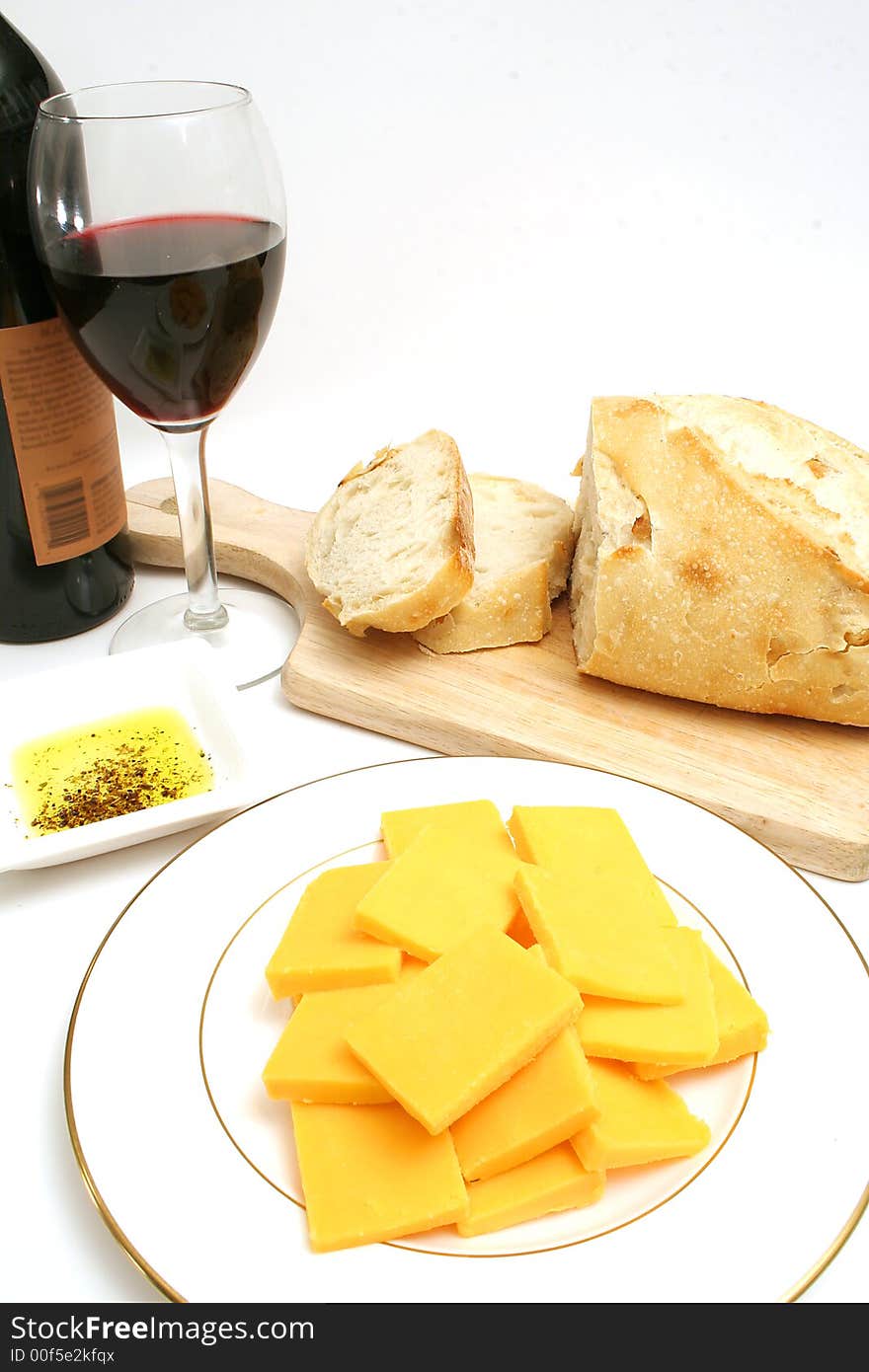 Isolated photo of wine and cheese on white vertical