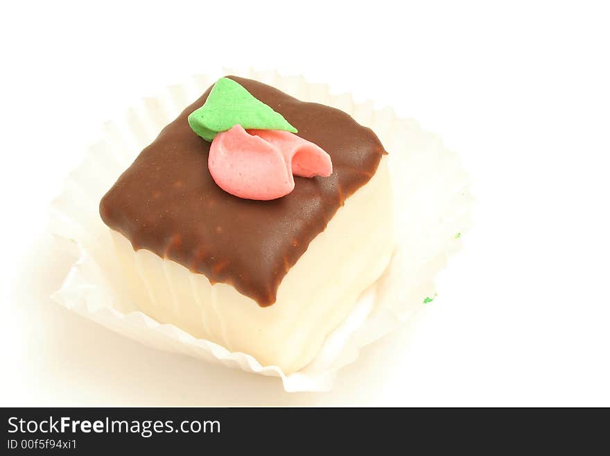 Isolated photo of a chocolate cupcake on white