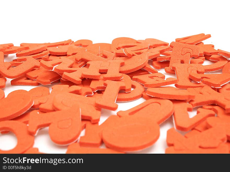 Isolated photo of scattered letters on white