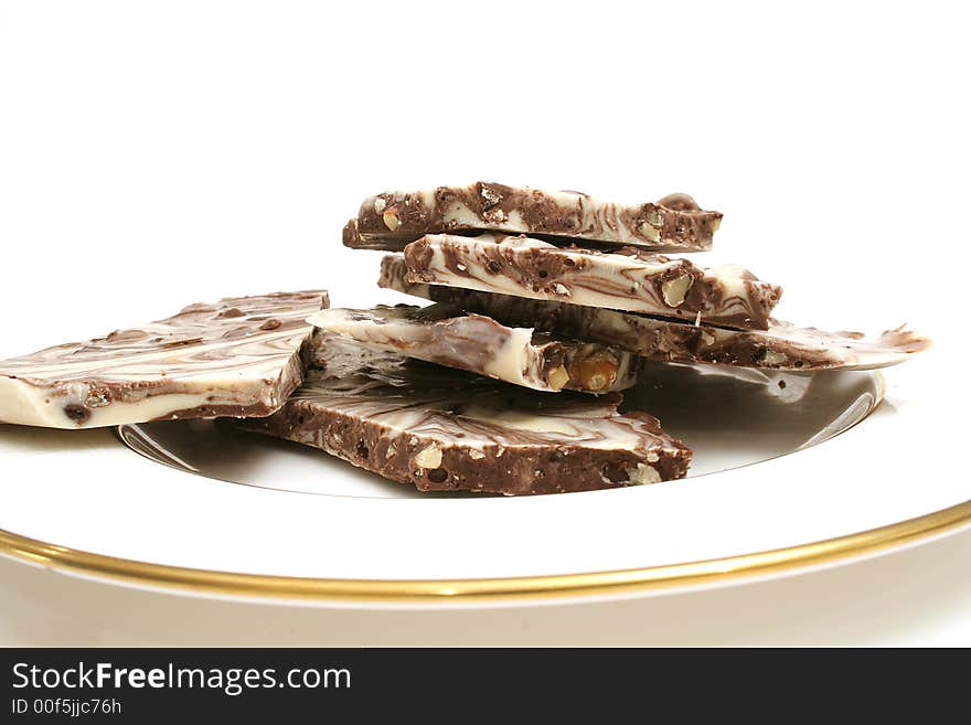 Isolated photo of chocolate candy level on white