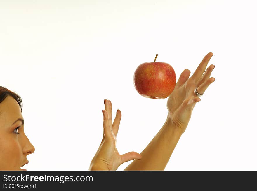 Healthy girl eating apples over a white background. Healthy girl eating apples over a white background