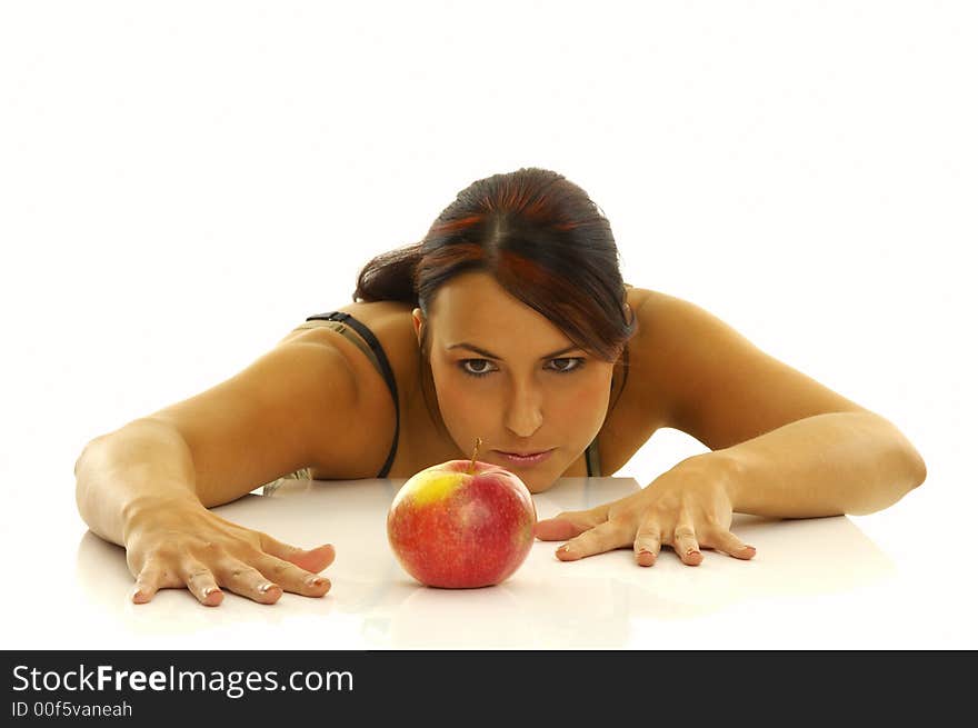 Healthy girl and apples over a white background