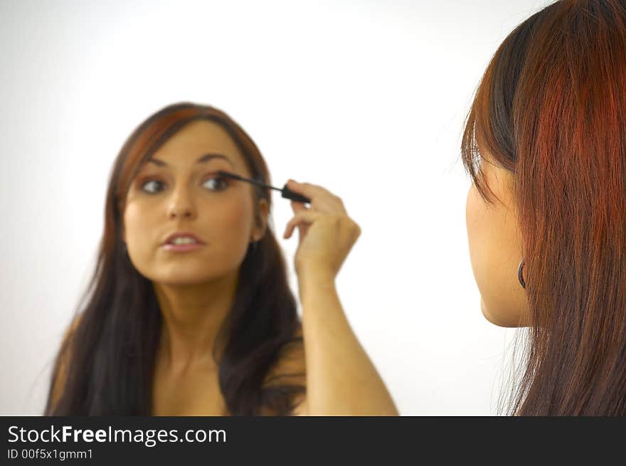 Beautiful Girl Applies Makeup