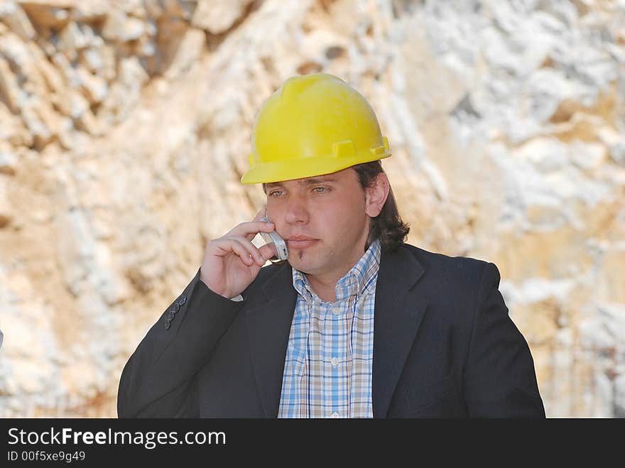 Boss talking on cell phone