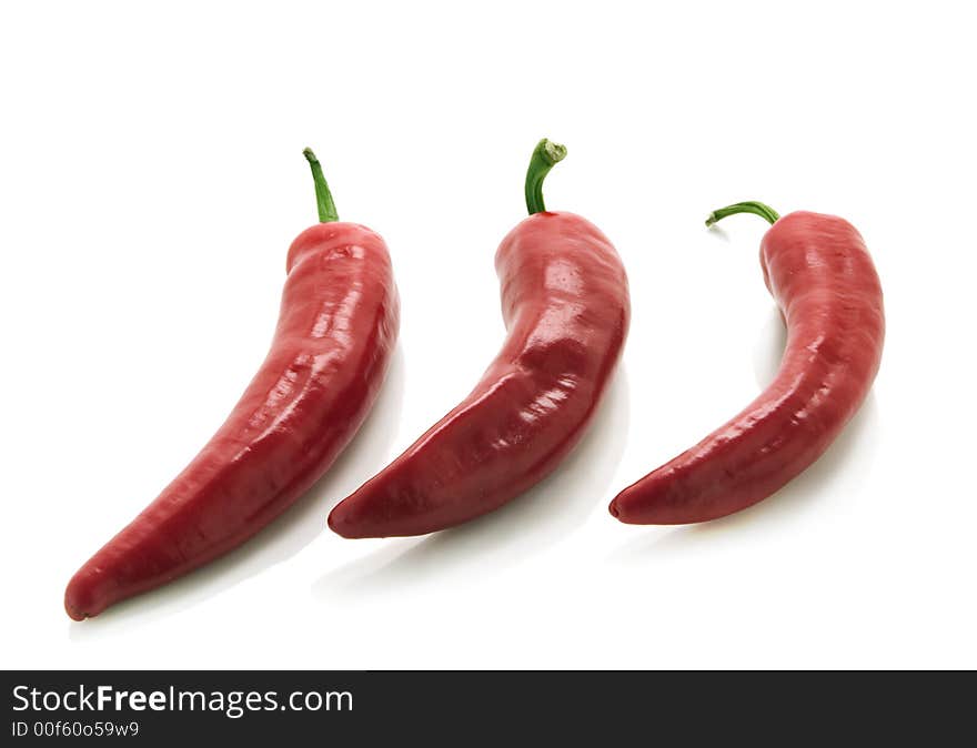 Red peppers isolated over white background