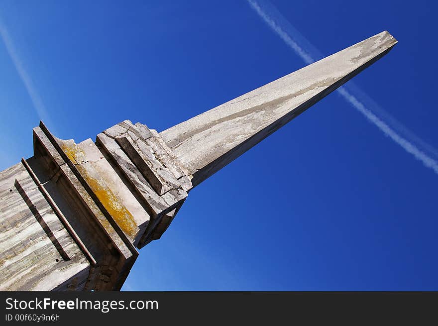 Marble spike in the dark blue sky. Marble spike in the dark blue sky