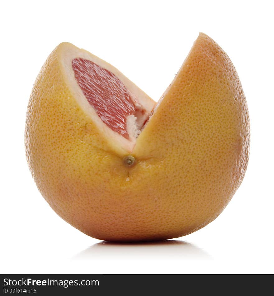 Sliced grapefruit over white background