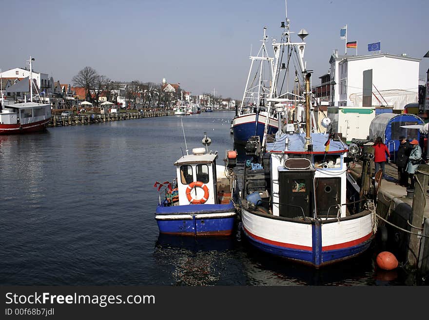 Fishing boats in a marina harbour